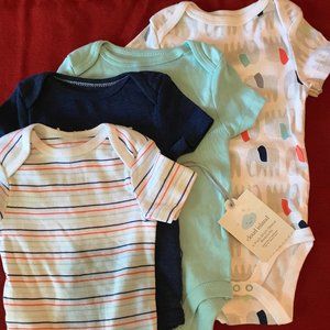 NWT Set of four onesies 6-9M